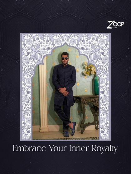 Embrace your inner royalty with this deep blue, intricately patterned sherwani from the Jazbaat Collection. It's a regal look, tailored for the man who commands attention.