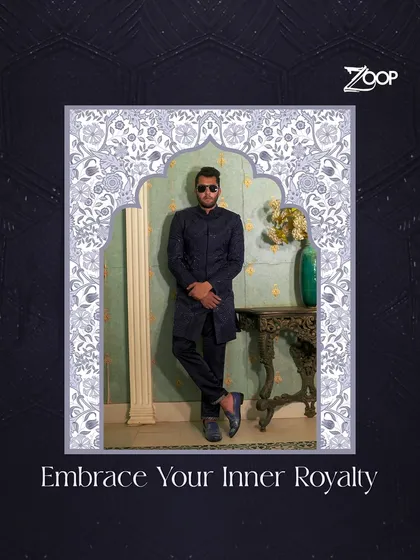 Embrace your inner royalty with this regal navy blue ensemble from the Jazbaat collection. The detailed texture and sharp tailoring are designed for the man who carries himself with confidence.