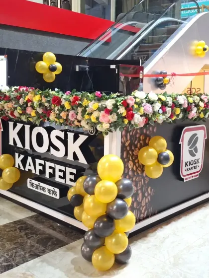 This shot highlights the complete decoration for the coffee kiosk. I focus on making sure every element, from the main entrance to the counter, works together to create a professional and exciting atmosphere for your grand opening.