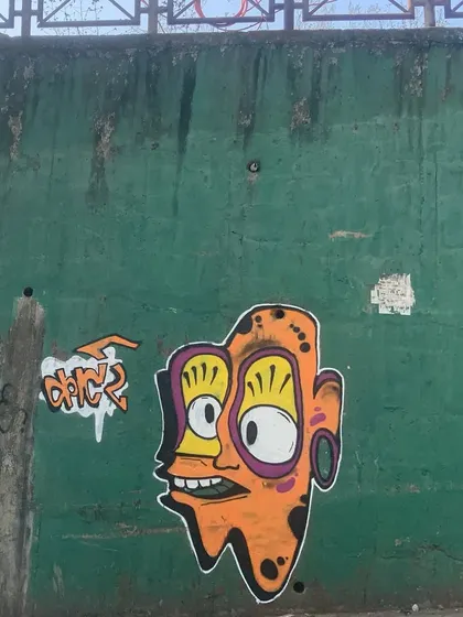 Another shot of the orange and yellow character, a quick piece to brighten up a dull wall.
