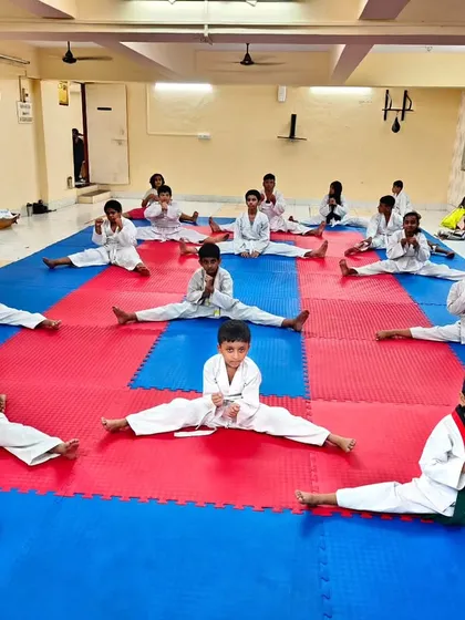 Flexibility is key to powerful kicks. Our students work on their splits and other stretches daily to improve their range of motion.