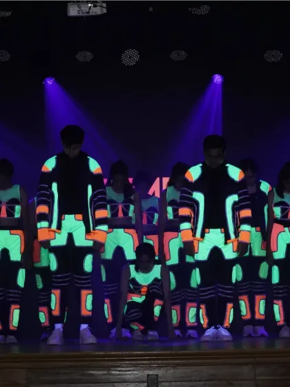 We love getting creative with our performances. This glow-in-the-dark hip hop routine was a huge hit, combining cool choreography with stunning visual effects to create a truly memorable stage act.