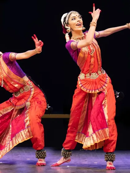 The energy of a group performance is electric. This image captures the 'maja' of playing a gopa, showcasing the synchronized and dynamic movements I choreograph for group productions. Whether for a solo artist or an ensemble, I aim to create a powerful visual narrative.