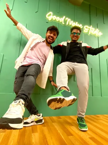 Good vibes only. Having a fun, candid moment at the studio with a friend.