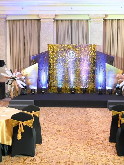A view of the stage from the guest tables. The strategic use of lighting and reflective surfaces created a dynamic and visually stunning focal point for the entire room.