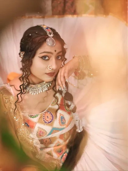An artistic close-up from the 'Gori Radha' shoot, focusing on the expressive eyes and traditional makeup.