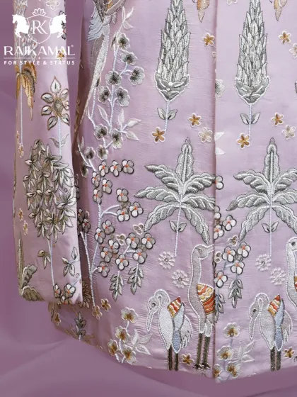 A view of the lower part of the lilac Jodhpuri, showing the intricate pattern of cranes and plant life.