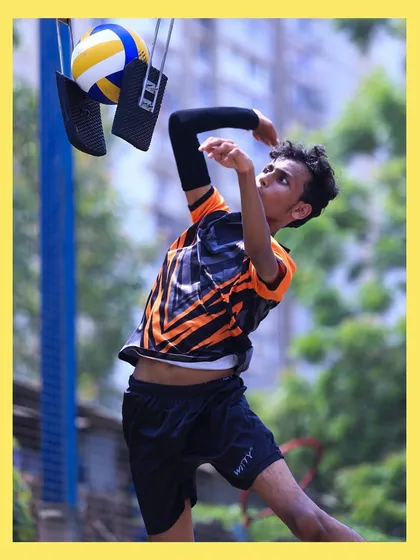 The follow-through of a powerful spike, practiced to perfection on our training rig.