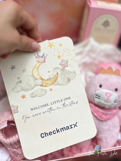 The personalized stationery is a key part of the story. This card, with its message "Welcome, little one, you were written in the stars," perfectly complements the celestial theme.