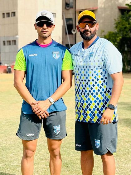 Standing with my star bowler, Anshuman Hooda. His 5-wicket haul was a proud moment for the entire Delhi Cricket Hub family.