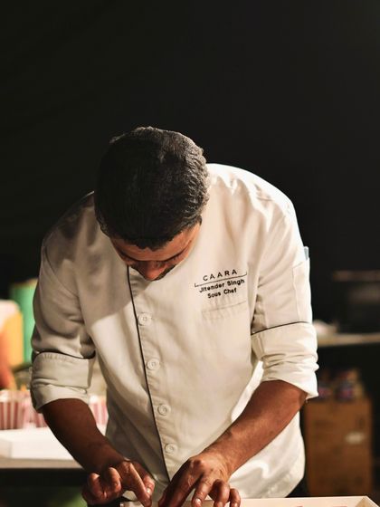 Our sous chef, Jitender Singh, carefully preparing canapés for an event. His focus and attention to detail are representative of the entire CAARA culinary team.