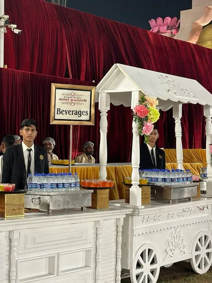 A beautifully designed beverage cart, offering water and other refreshments. Our setups are designed to be both practical and aesthetically pleasing.