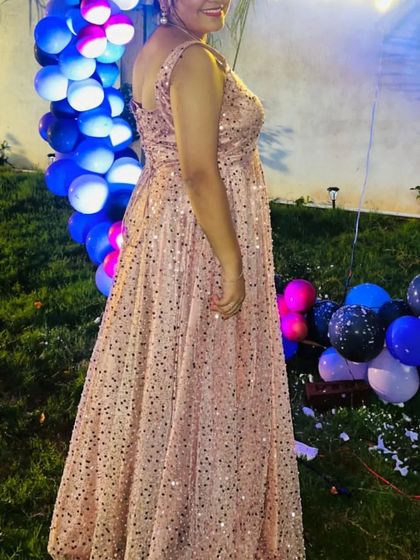 You can celebrate your birthday in style with my designed outfits. This sequined pink gown is a great rental option, with prices starting from just INR 500.