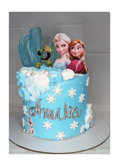 Let it go! This Frozen themed cake is a fresh pineapple flavor, decorated with snowflakes and an icy blue color scheme. It's perfect for a magical winter birthday.