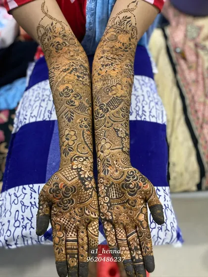 For the ultimate bridal look, my signature organic henna cones are the perfect choice. This full-arm design shows the intricate and detailed work that is possible, resulting in a rich, dark stain that is essential for a bride's special day.