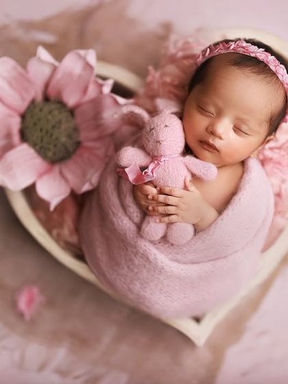 All my love. This heart-shaped bowl is a perfect prop for showcasing a precious newborn, surrounded by soft pinks and a tiny bunny.