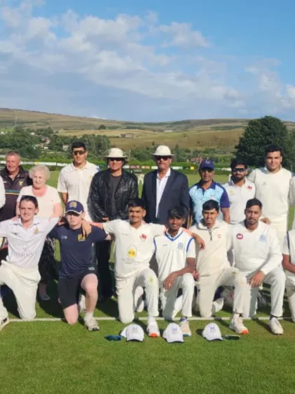 The team celebrates a comprehensive victory against Littleborough Cricket Club to start the tour. A strong performance like this sets the tone for the rest of the matches.
