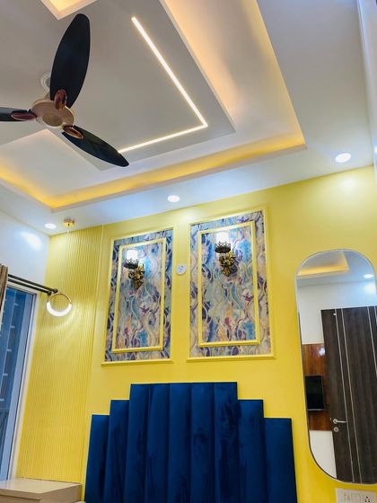 A final look at the master bedroom's feature wall, combining bold colors and textures for a royal feel.