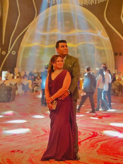 A candid shot of the client with her long braid, showing how the style is both beautiful and practical for a large event.