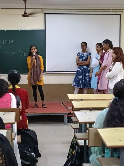 It's so rewarding to see students take the stage and practice their presentation skills. This young woman is demonstrating her group discussion abilities during our workshop in Visakhapatnam.