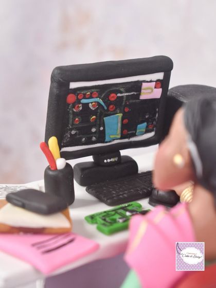 Another close-up of the tiny details on the desk, including the circuit boards and pen stand.