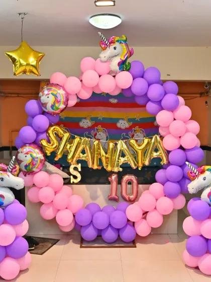 The full Unicorn theme balloon decoration, including a circular arch and pillars, creating a perfect photo opportunity.