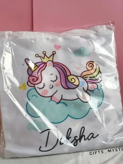 A personalized pillow with a sleepy unicorn design. How cute is this for a birthday princess?