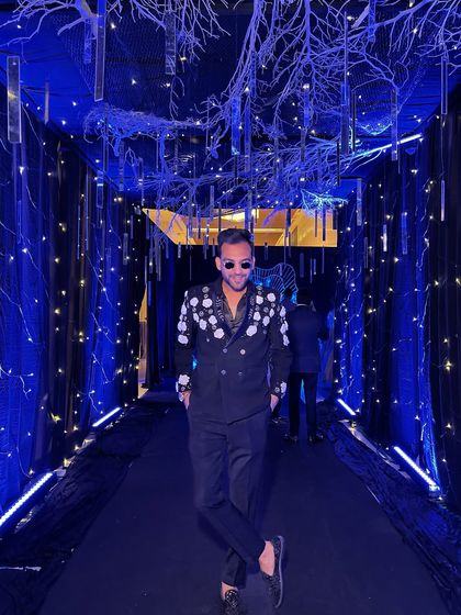 Serving looks and entertainment at a Sangeet in Thailand. This stylish black and white blazer was perfect for the glamorous evening.