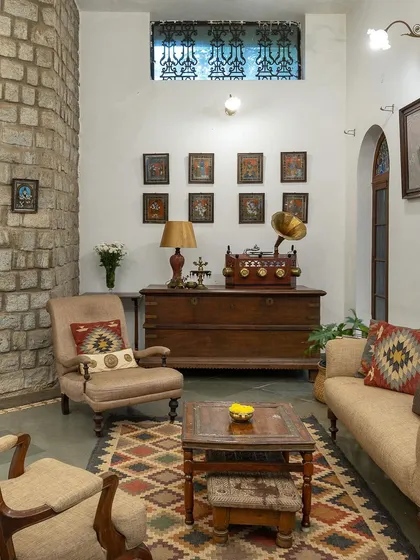 This corner of our heritage villa features an antique gramophone and chest, details that transport you to a bygone era of elegance.