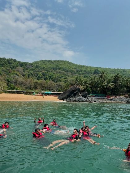 Floating freely in the calm sea waters off the coast of Gokarna, a perfectly relaxing moment.