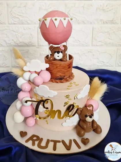 This is one of my favorite designs ever. A cute teddy bear in a hot air balloon, made for a first birthday. I love crafting these detailed fondant figures and balloon elements to make a celebration truly memorable.