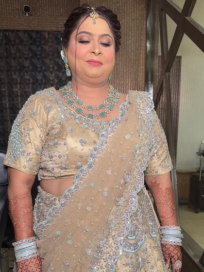 A close-up of this beautiful party makeup. The focus is on flawless skin and soft, defined eyes.