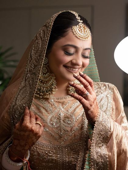 A happy, smiling shot of the bride. Her joy is infectious, and her makeup enhances her natural radiance.