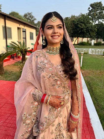 A happy smile from my beautiful daytime bride. The makeup is fresh and light, with a focus on dewy skin and soft eyes, perfect for a Sikh wedding ceremony.