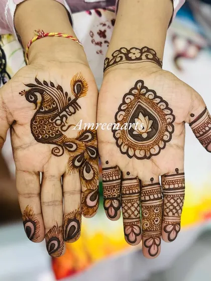 A special mehandi for Krishna Janmashtami. This design features a graceful peacock on one hand and a lotus motif on the other, both symbols associated with Lord Krishna.