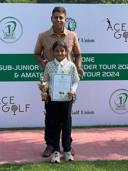 Suhani Chandra with her coach after her podium finish at the IGU North Zone tournament.