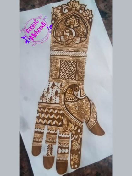 The peacock is a classic and beloved motif in Indian mehendi. In my class, you will learn how to construct and fill peacock designs, from simple to intricate, as shown in this practice piece.