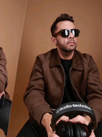 A stylish shot from a recent photoshoot. As a performer, I understand the importance of having a strong brand and professional image.