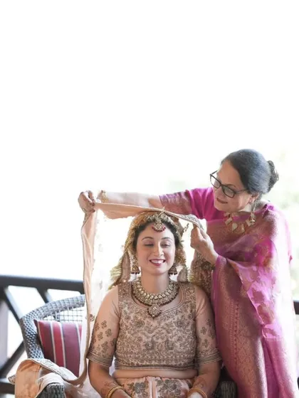 A tender moment as a mother places the veil on her daughter. It is these quiet, emotional connections that I strive to honor and make space for amidst the grand celebrations.