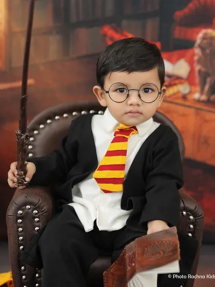Wingardium Leviosa! A magical moment from our popular Harry Potter themed photoshoot, perfect for little wizards. We provide the complete costume and props for an authentic Hogwarts experience.