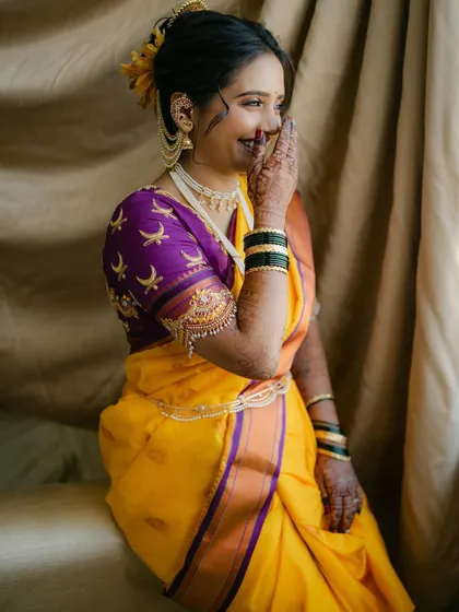 A candid laugh, the best accessory. Her makeup is designed to look great in every moment, whether posed or spontaneous.