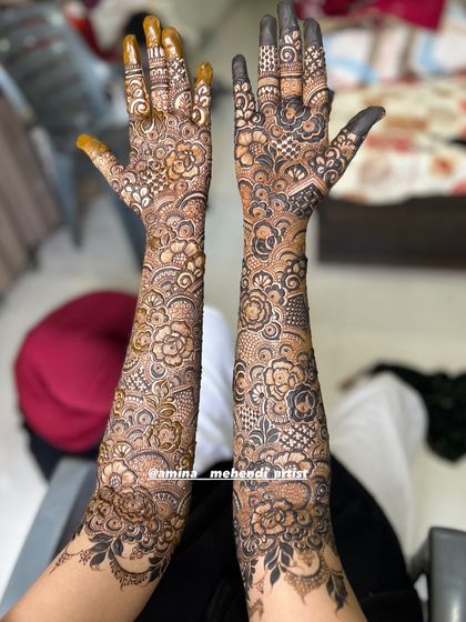 A full bridal design with a focus on flowing, interconnected patterns that create a seamless look.