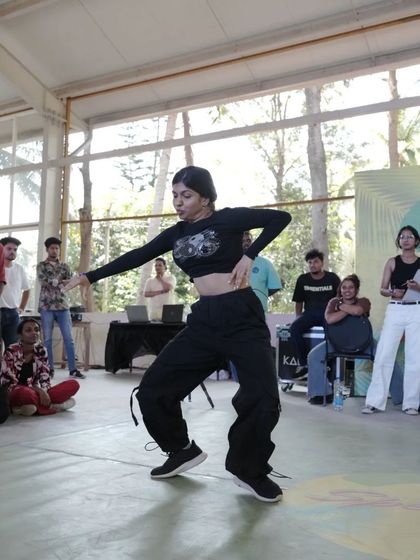 Another moment from the battles, with a dancer showcasing her unique style and flow.