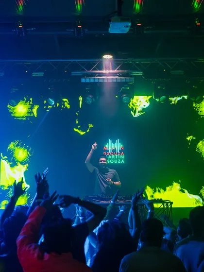 Me commanding the stage with a massive LED screen behind me. The visual production at Happy Brew is fantastic.