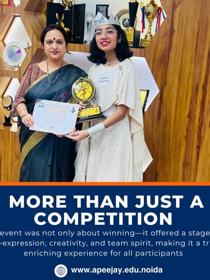 A student receives her award from the Principal after winning at the Cultural Fest. The event was more than just a competition; it was a stage for self-expression, creativity, and team spirit, making it a truly enriching experience for all.
