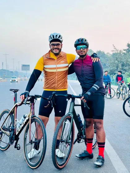 A moment of friendship and encouragement between two members on the road.