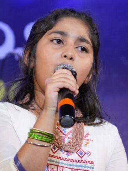 A focused shot of Kyra Puri, one of our talented young singers, performing at Kalaa Sangama 2024.