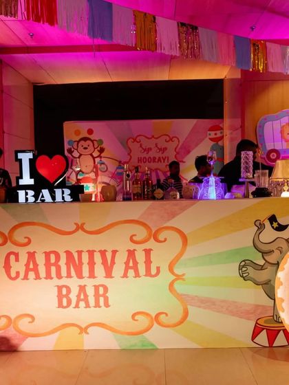 A fully themed "Carnival Bar" for the adults, showing how the theme can be extended to all aspects of the party.