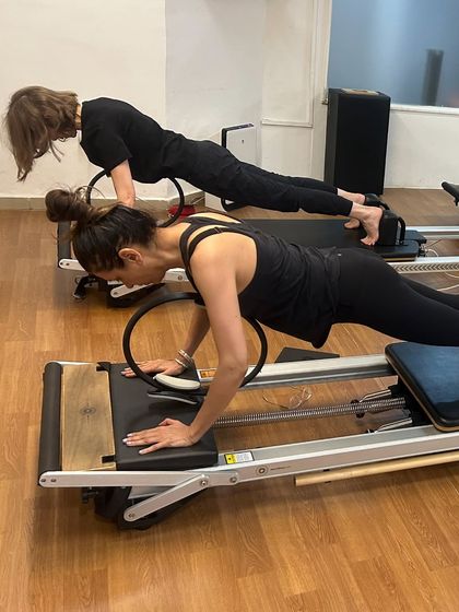 Reformer Pilates: Sculpt & Strengthen photo 32