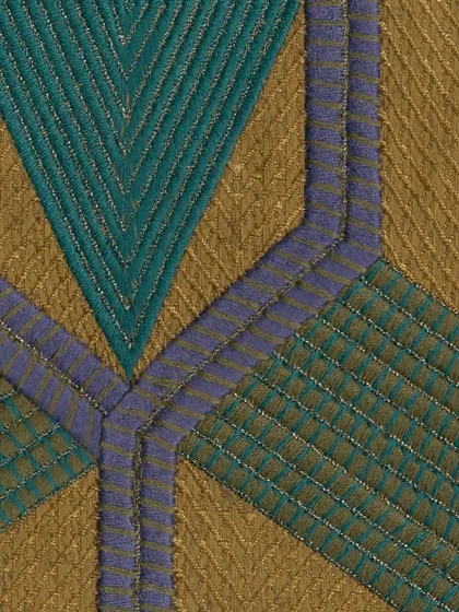A macro view of a sculpted jacquard fabric from Élitis. The intricate stitching and interplay of teal, purple, and gold threads create a geometric pattern with incredible depth and tactile appeal, showcasing true textile artistry.
